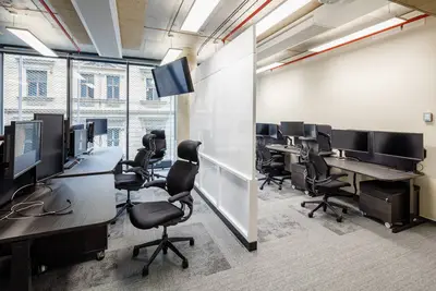 Room layout can be changed quickly using sliding partitions between work areas.
